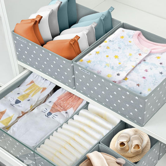 The Secret to a Dreamy Nursery: Organize Everything from Diapers to Onesies with Grey Heart Storage Bins.